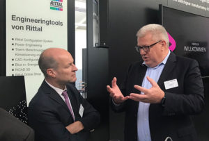 Animated discussions about ONCITE. At the right: SupplyOn CEO Markus Quicken