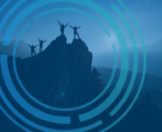 Four people stand with arms raised on a mountain peak, silhouetted against a blue sky with circular graphic overlay elements in the foreground.